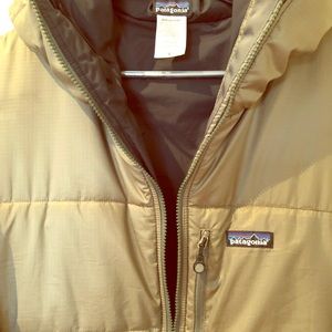 Olive green Patagonia puffer jacket.